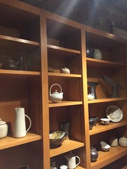 shelves with pottery