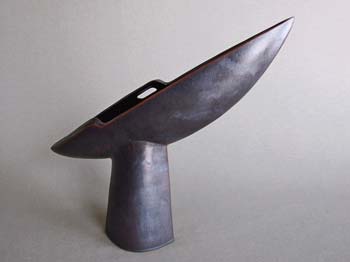 flying boat shaped sculpture, black glaze